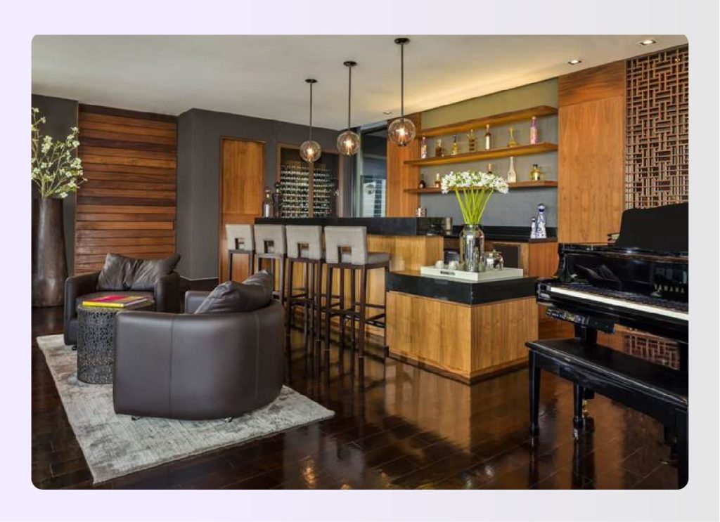 Luxury home bar with wooden accents and piano