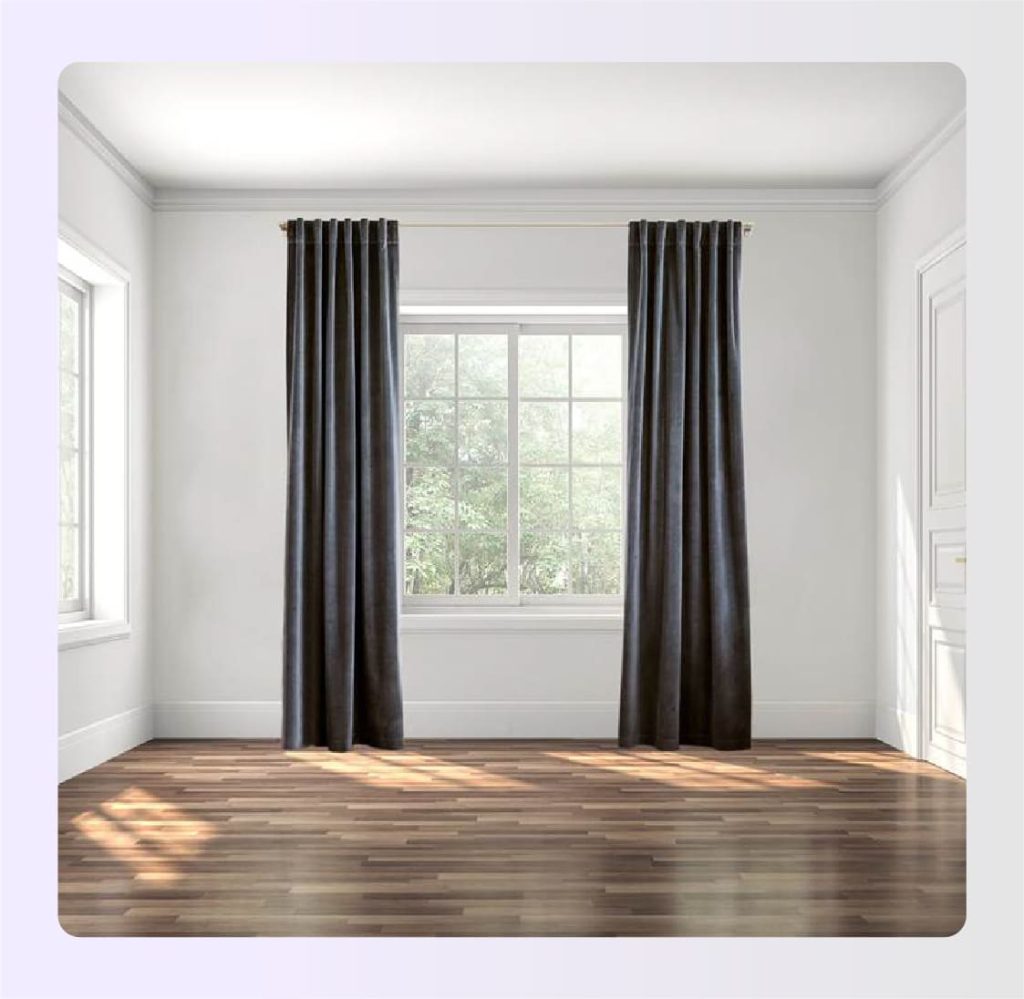 Grey floor length curtains in an empty room