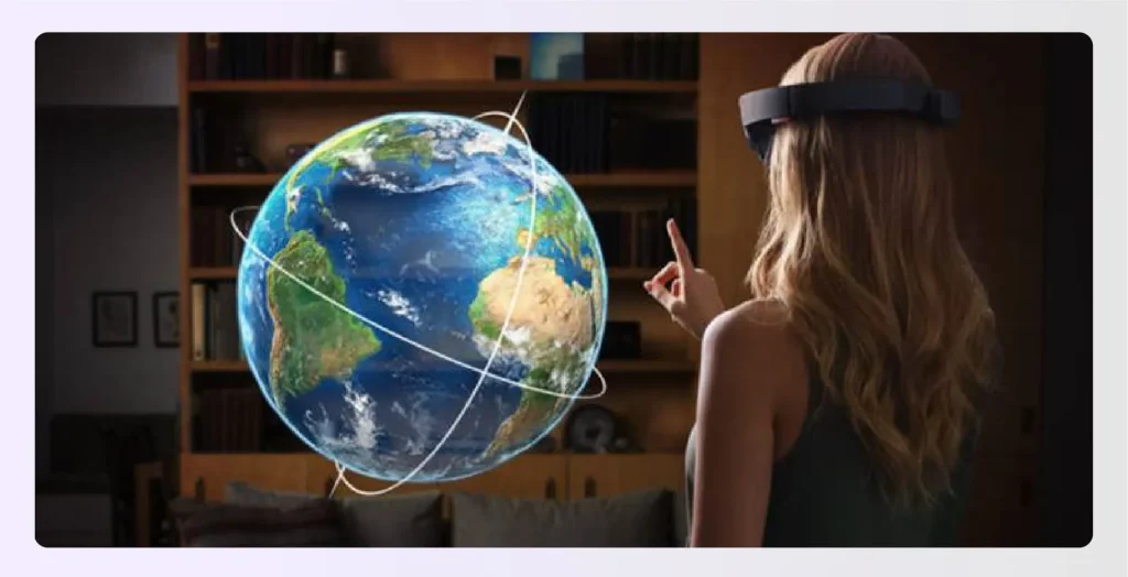 Woman in AR headset interacting with 3D globe hologramย Woman in AR headset interacting with 3D globe hologramย