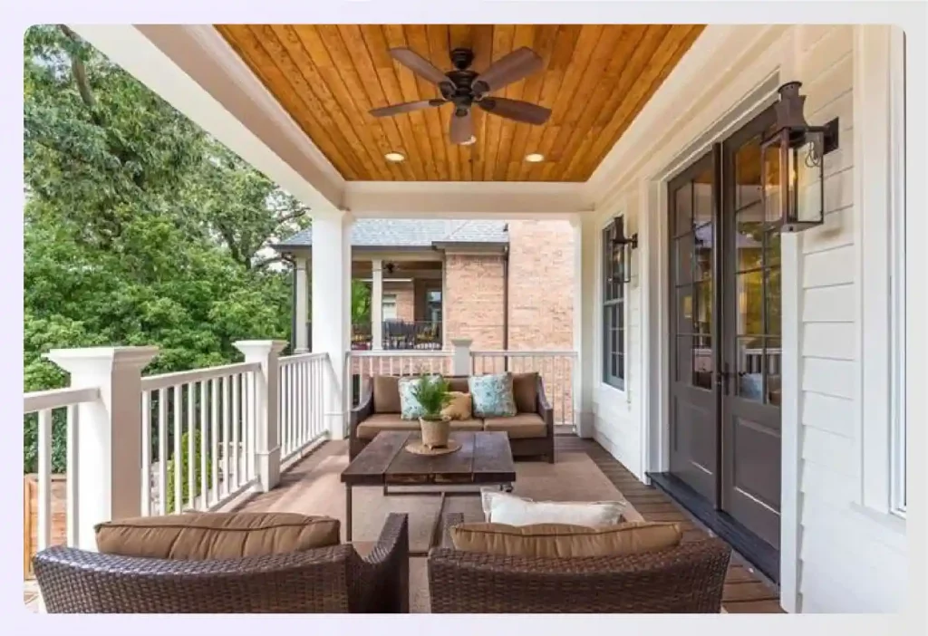 Covered porch with a beautiful wooden plank ceiling