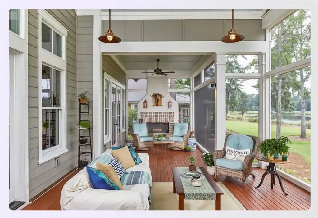 Cozy screened-in back porch with comfortable furniture