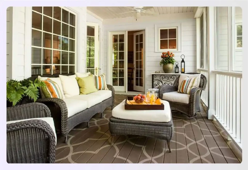 White porch with wicker furniture and patterned flooring