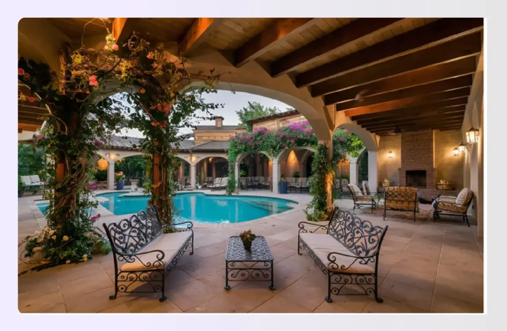 Ranch-style patio by pool with arches and wood beams