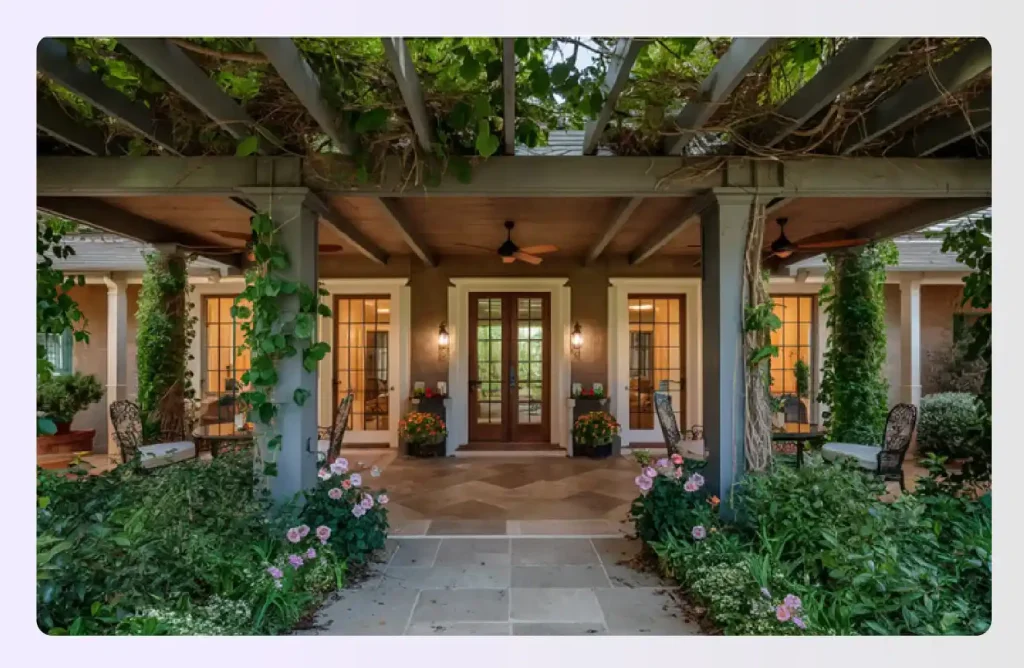 Sheltered stone patio with ceiling fans and French doors