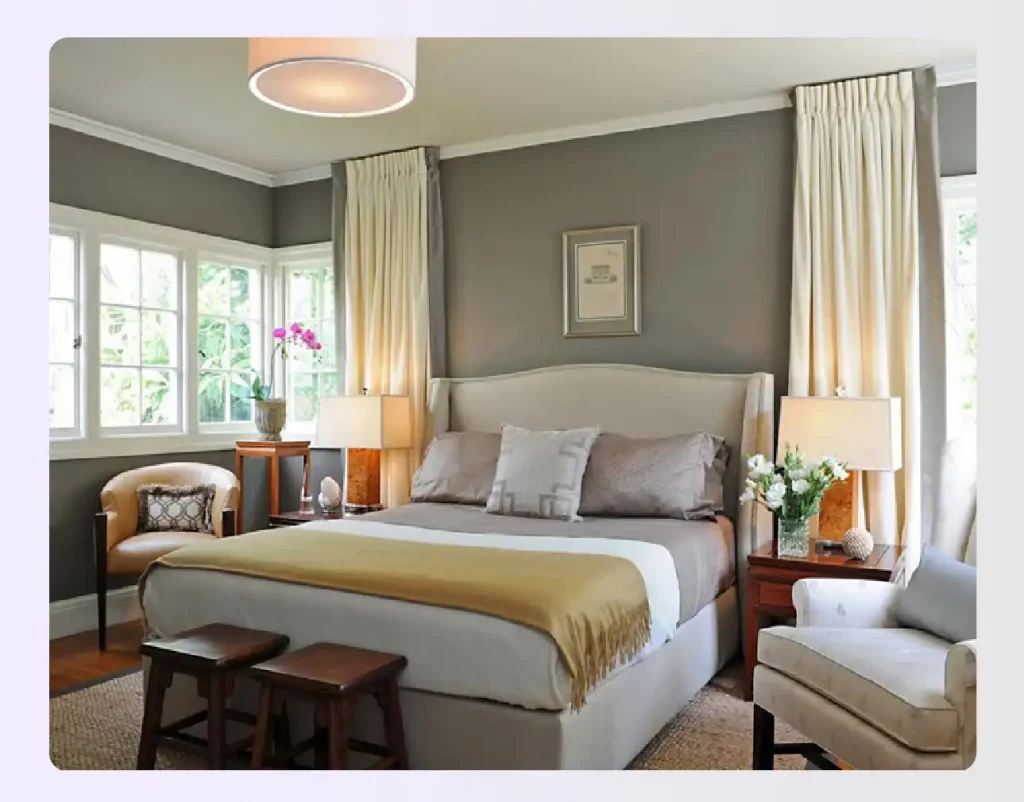 A neutral bedroom with warm wood and honey tones