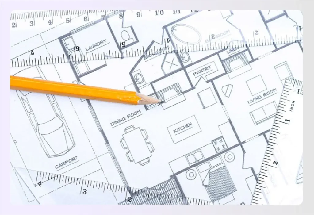 Blueprints and rulers for interior design measurements 
