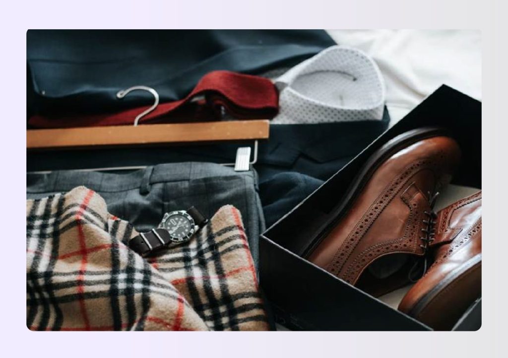 Professional business attire laid out on bed