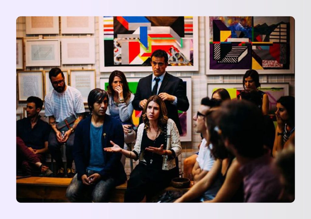 Group of people discussing at a design event