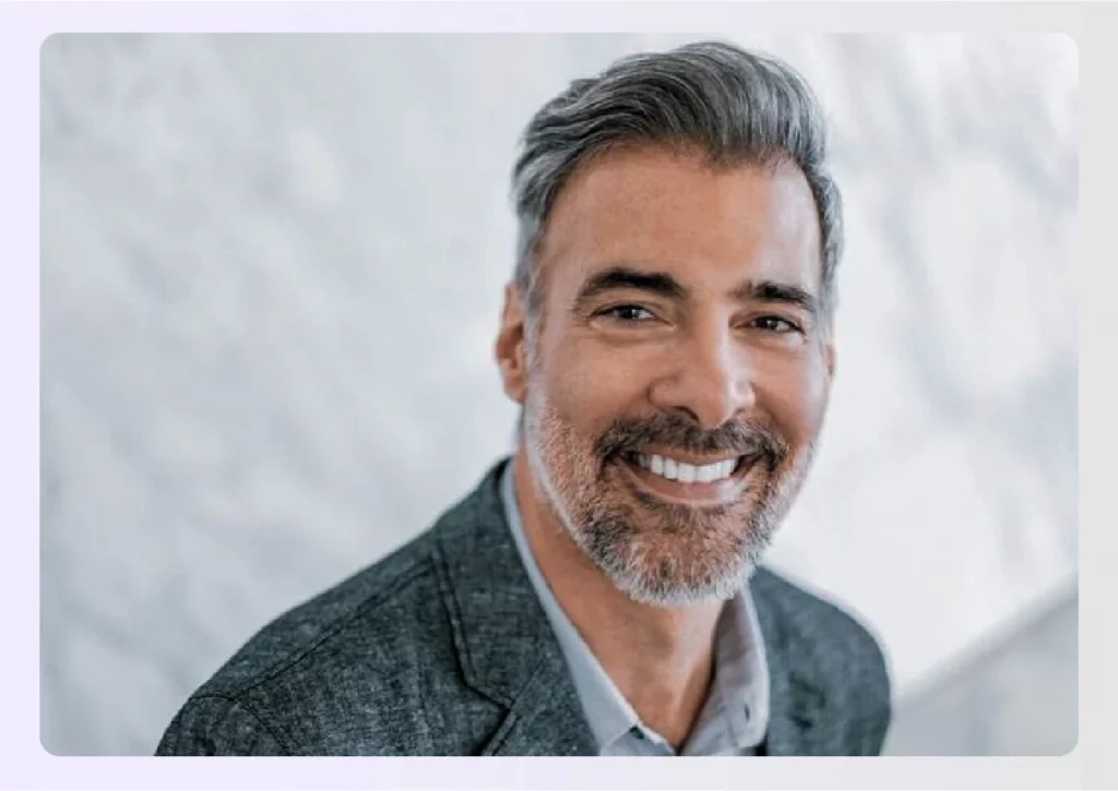 Portrait of designer Demitri Sgourakis smiling