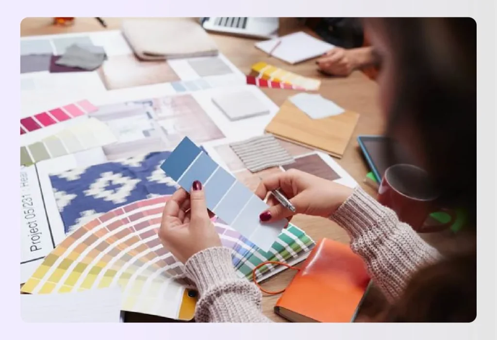 Designer selecting color swatches for project mood board Designer selecting color swatches for project mood board