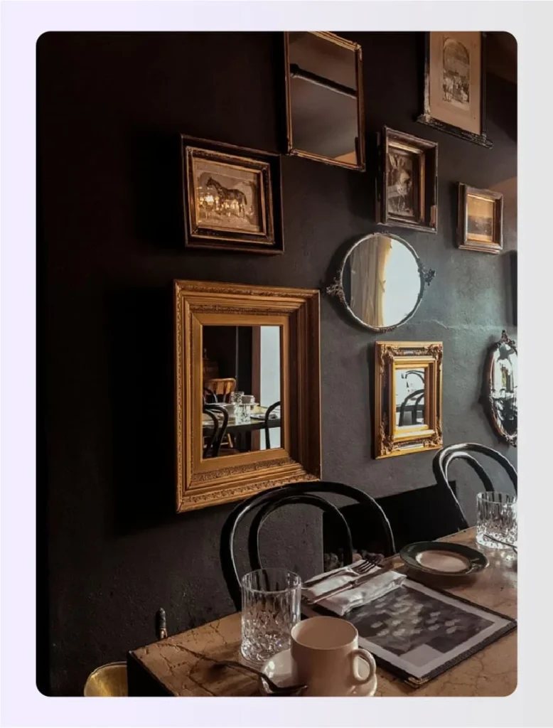 Gallery wall featuring vintage mirrors Gallery wall featuring vintage mirrors