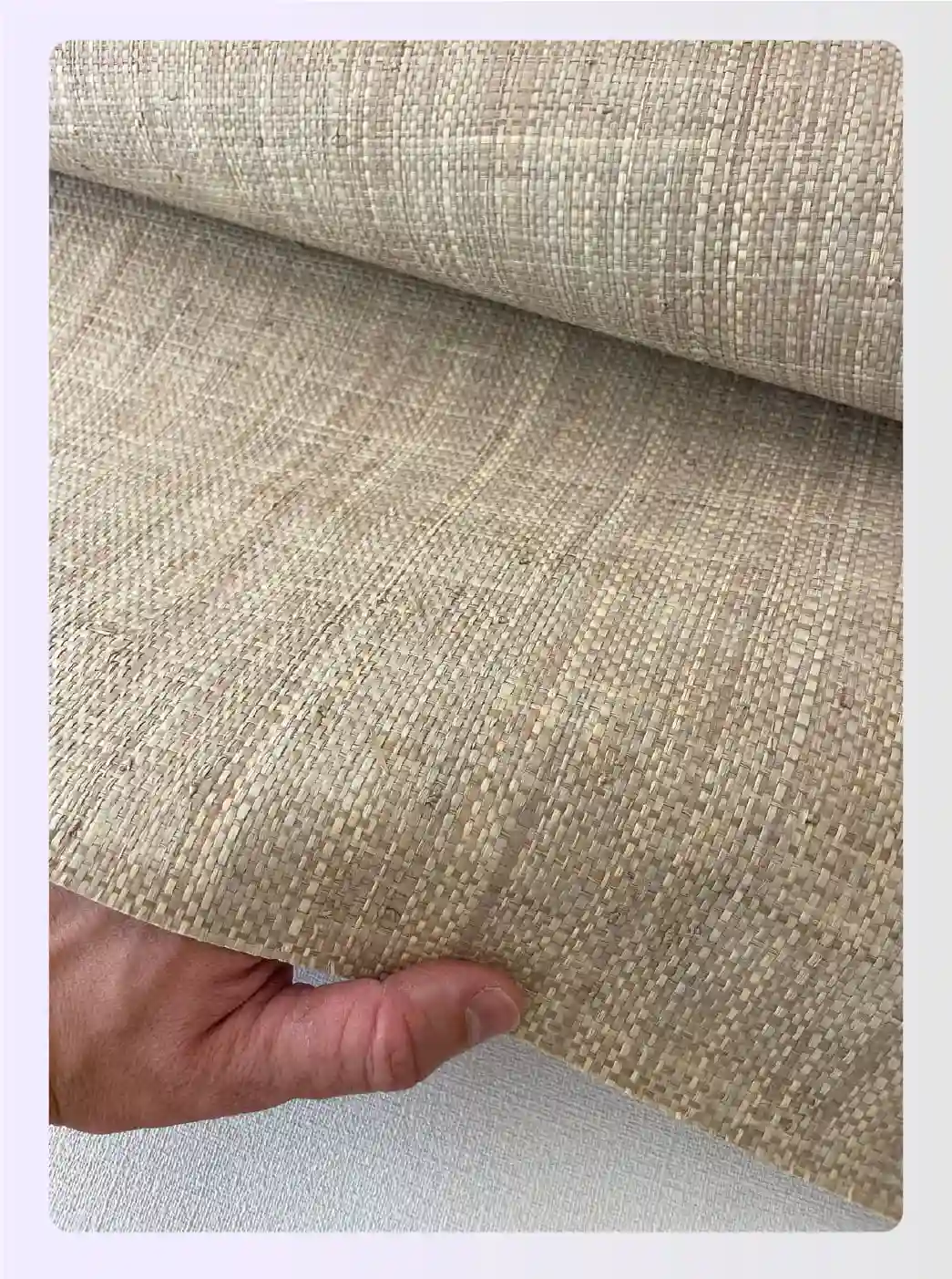 Close up detail of beige grasscloth wallpaper texture Close up detail of beige grasscloth wallpaper texture