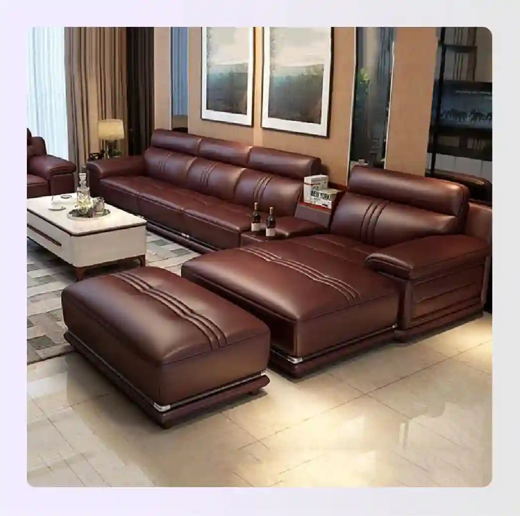 Modern brown leather sectional sofa in a luxury living room Modern brown leather sectional sofa in a luxury living room