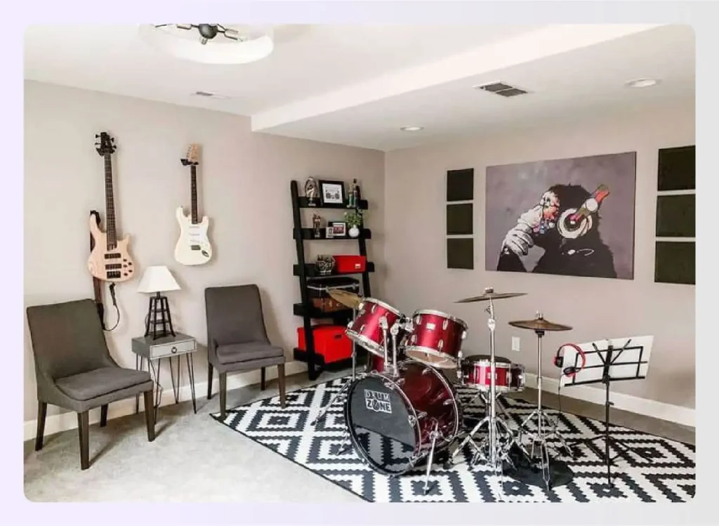 Music room with guitars on wall and drum set