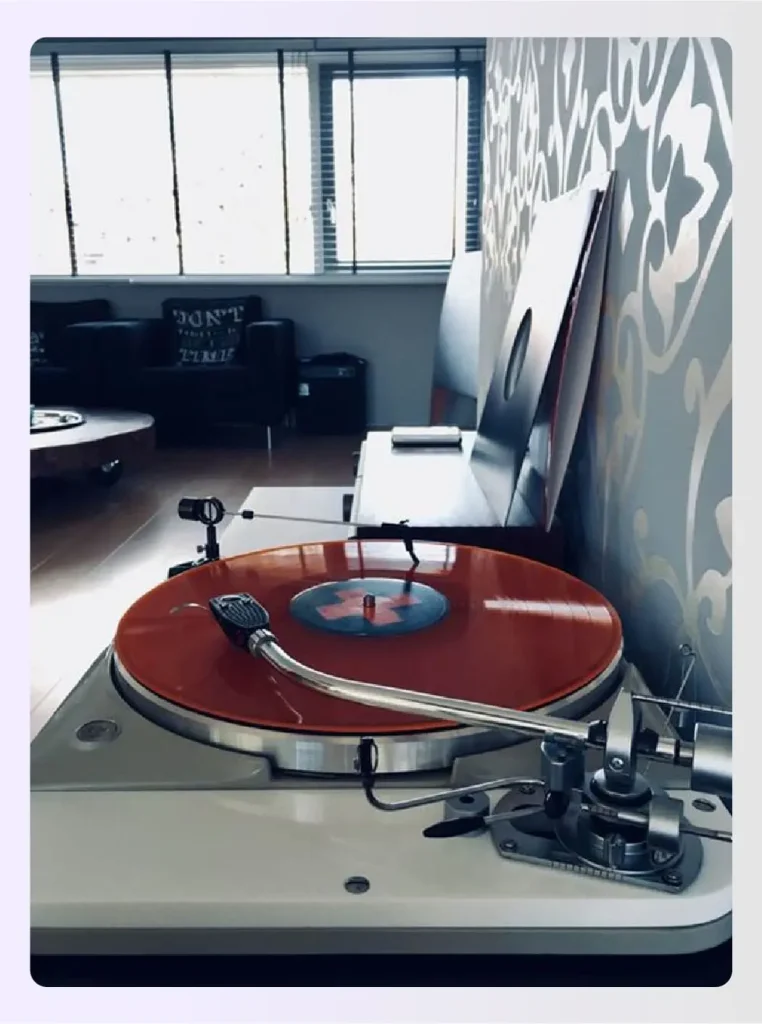Vintage record player on a console table