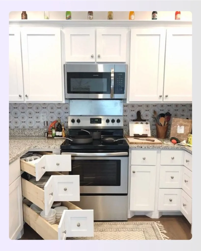 White kitchen with pull-out drawers maximizing functional storage space