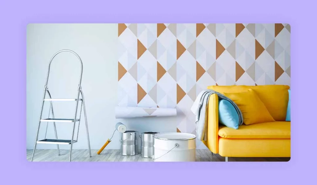 Stylish yellow couch with ladder before patterned wall