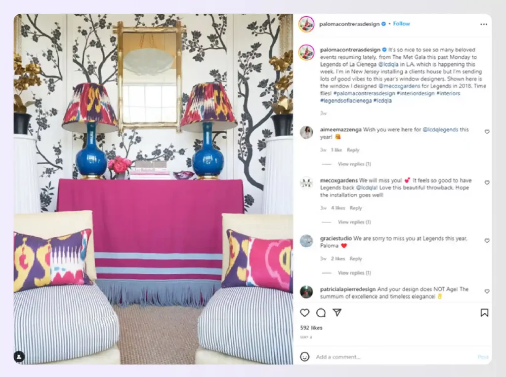 A vibrant room with patterned wallpaper and colorful decor