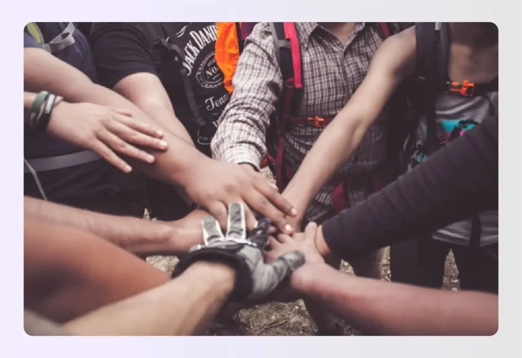 Team hands stack for interior design scope collaboration