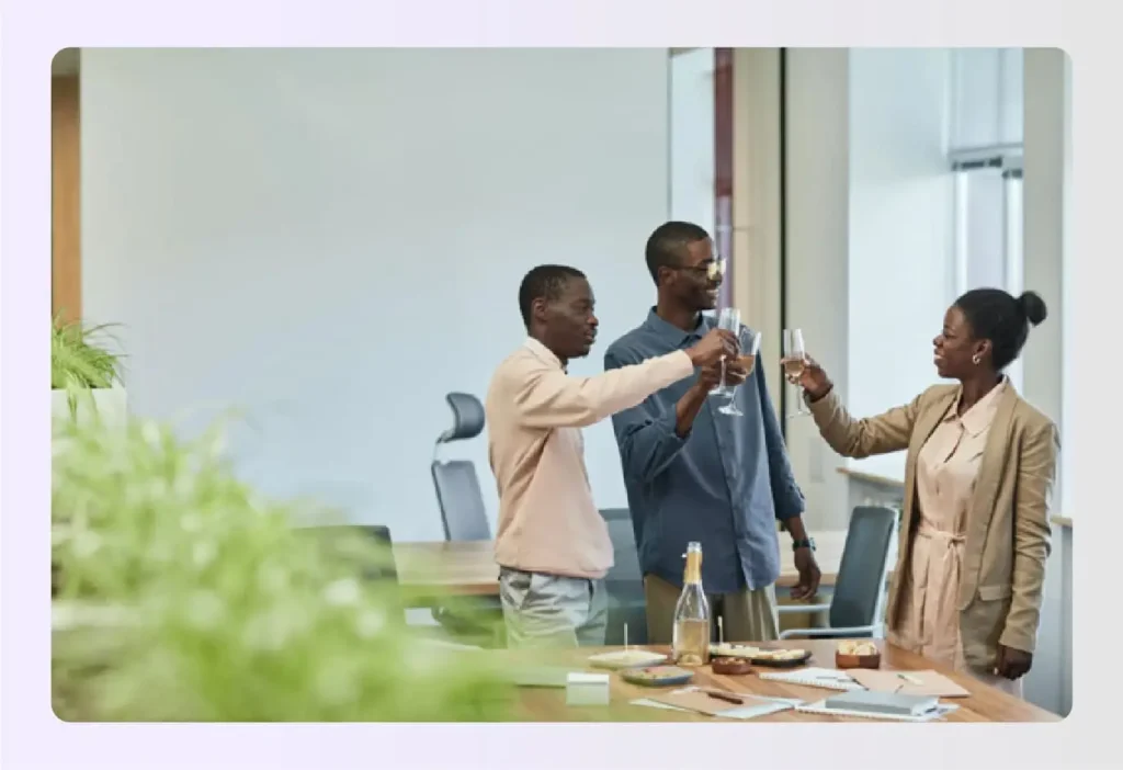 Team toasting interior design scope of work milestones