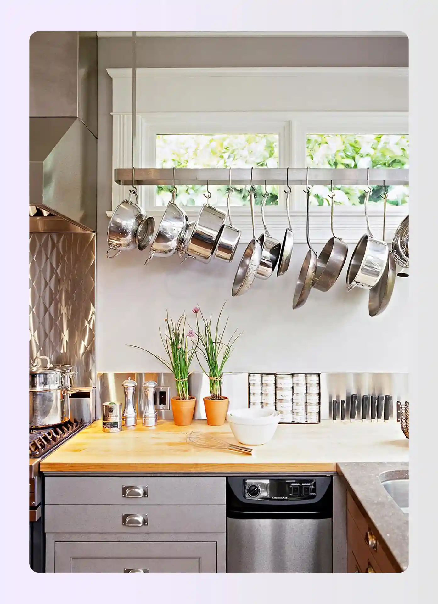 Hanging copper pots over kitchen island as wall decor Hanging copper pots over kitchen island as wall decor