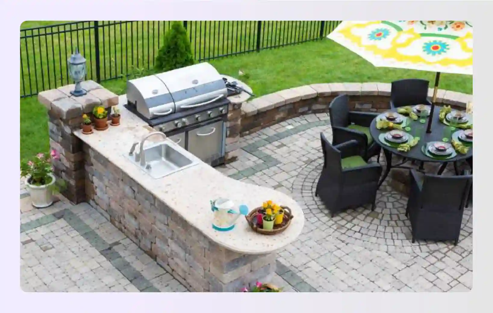 Curved stone outdoor bar layout on a patio with pavers Curved stone outdoor bar layout on a patio with pavers