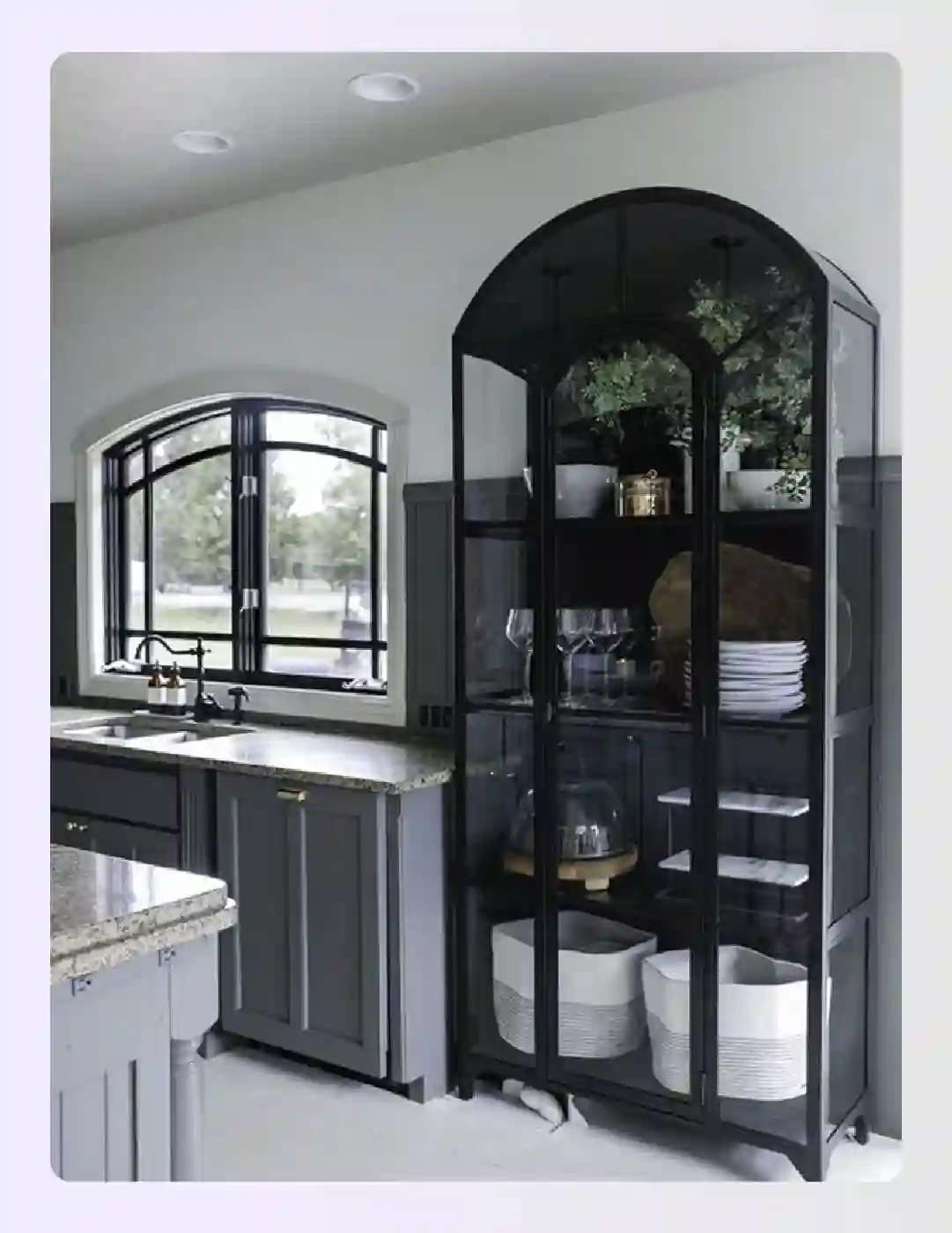 Elegant black glass cabinet in a modern cottage outdoor kitchen Elegant black glass cabinet in a modern cottage outdoor kitchen