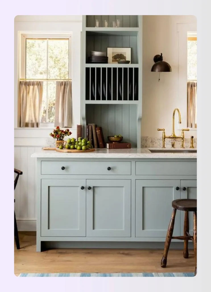 Open cubby display shelves on kitchen wall with books and decor Open cubby display shelves on kitchen wall with books and decor