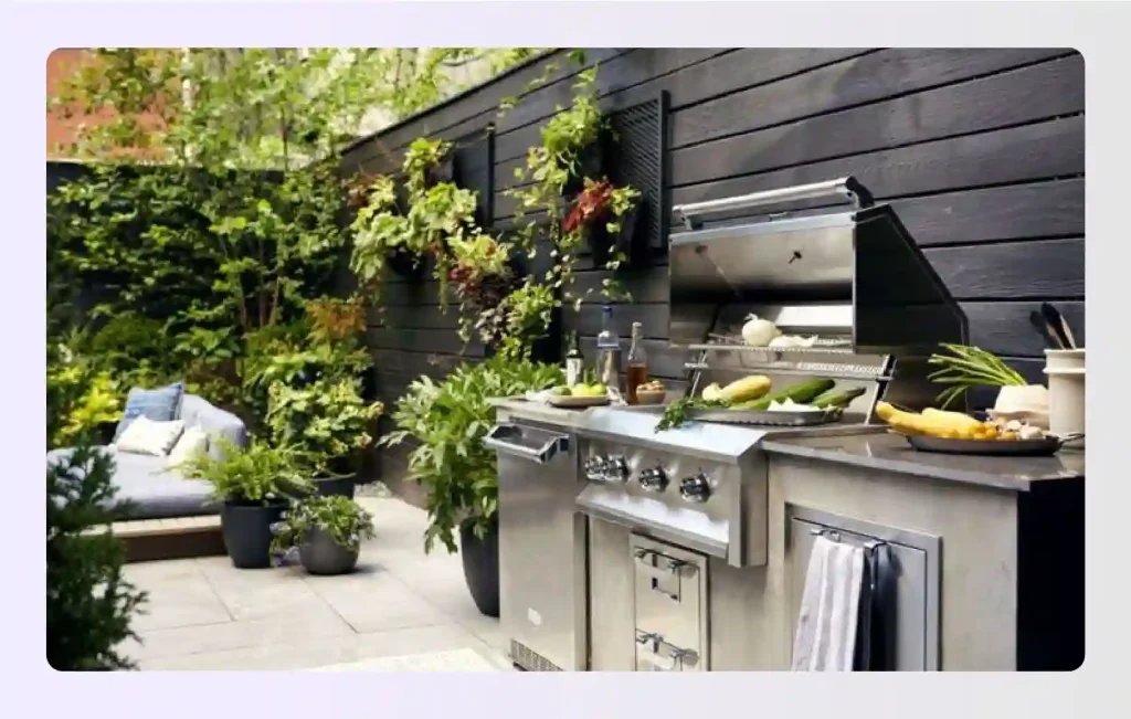 Modern outdoor kitchen with stainless steel grill and stone features