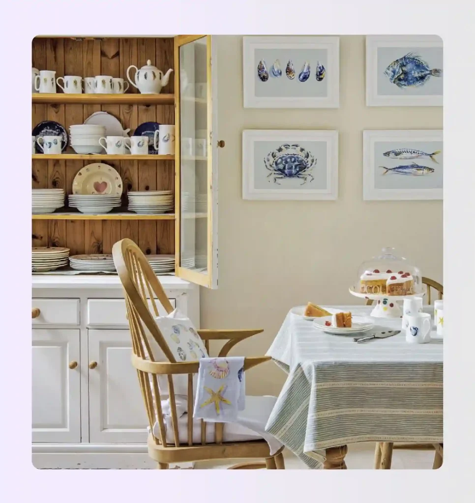 Themed vintage art prints displayed on contemporary kitchen wall Themed vintage art prints displayed on contemporary kitchen wall