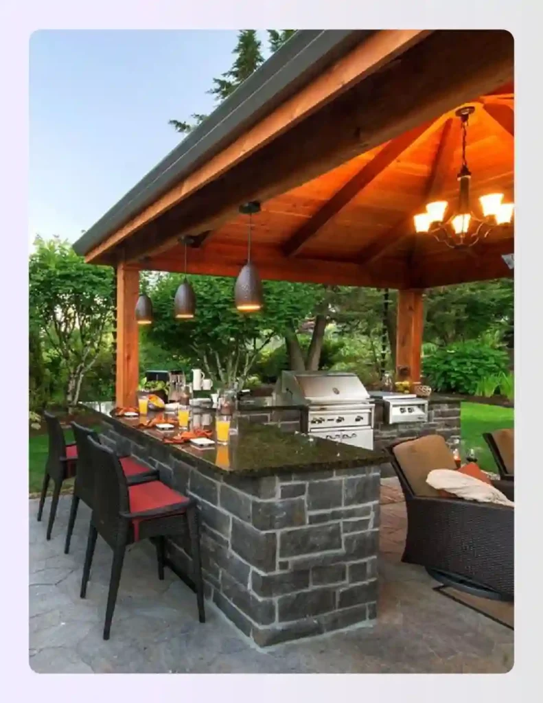 Stone outdoor bar with warm lighting and wooden roof structure Stone outdoor bar with warm lighting and wooden roof structure