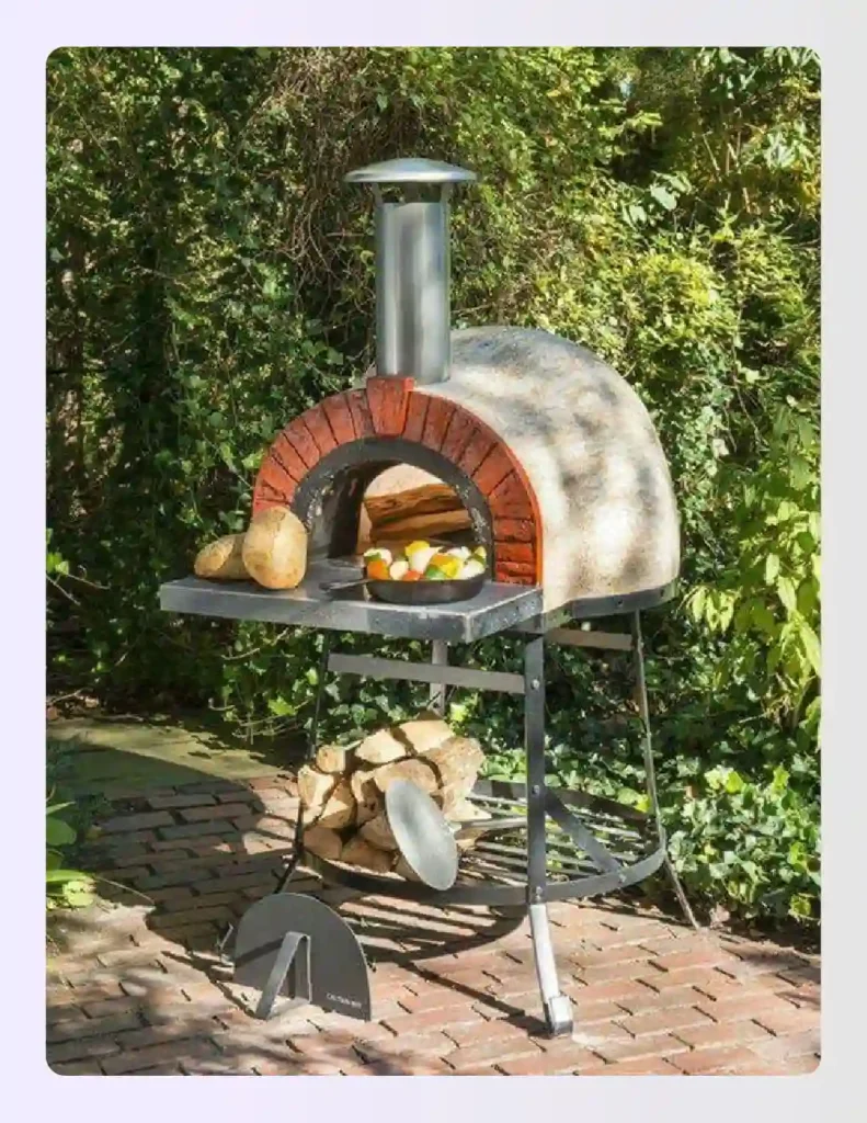 Authentic clay pizza oven on a brick patio with greenery Authentic clay pizza oven on a brick patio with greenery