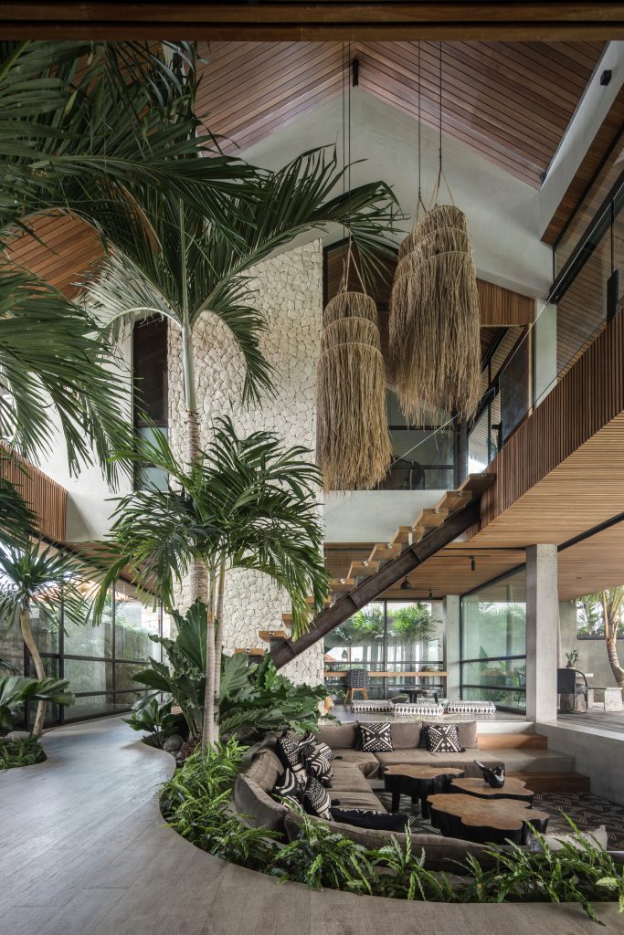 sunken living room under high vaulted ceiling