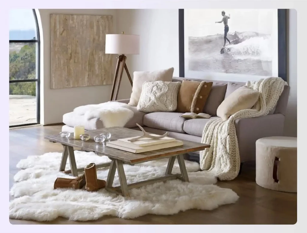 Cozy couch layered with plush blankets and pillows