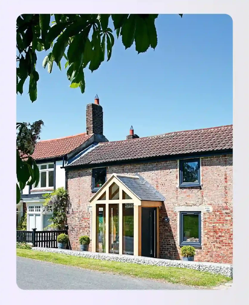 A modern glass and timber porch house extension idea.