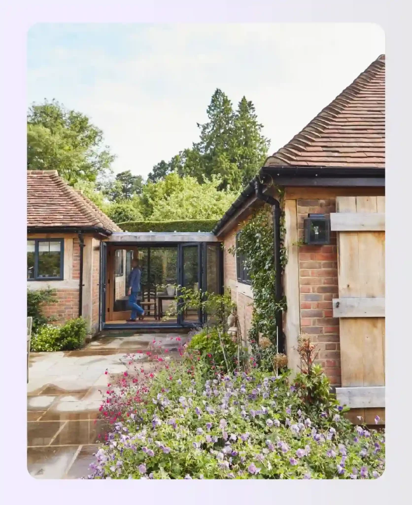 Glazed walkway design connecting garage and main home