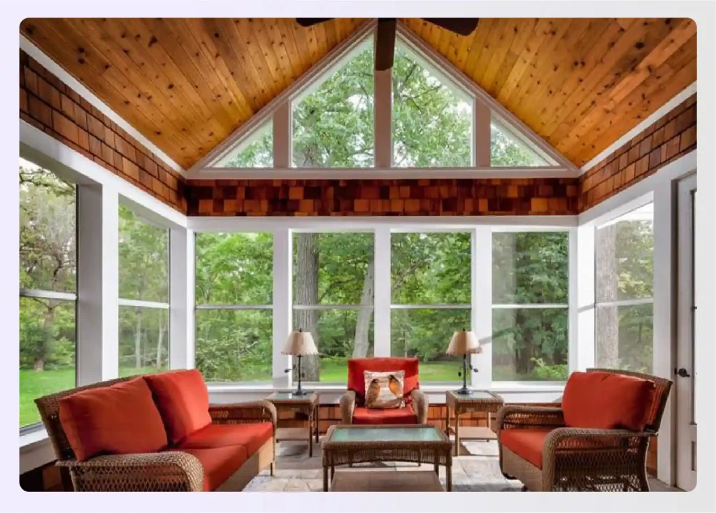 Cozy four-season sunroom with wicker furniture