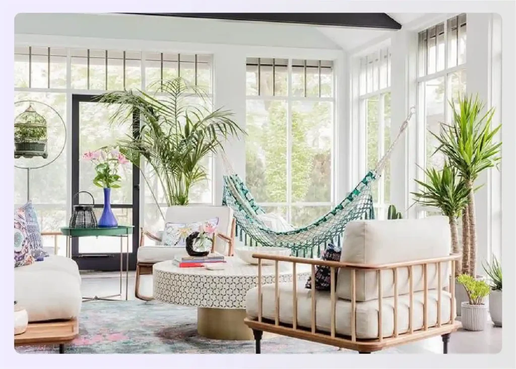 Stylish sunroom with a hammock and plants