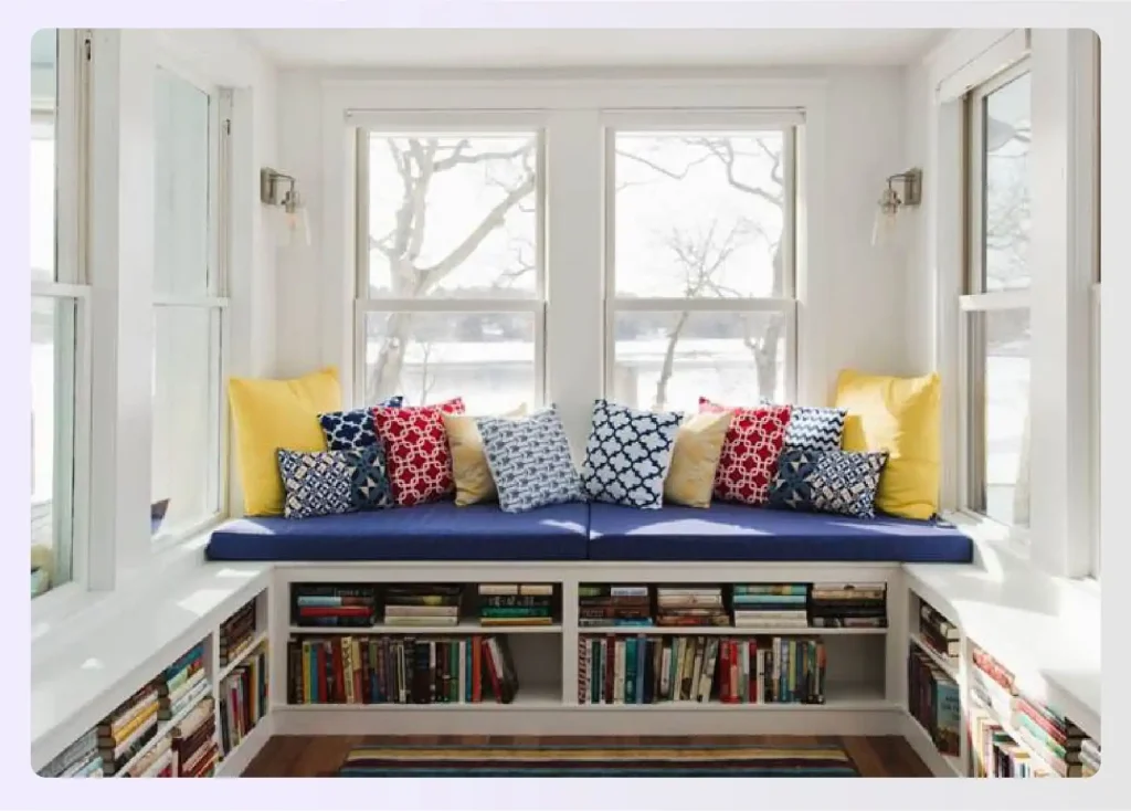 Sunroom reading nook with built-in bench storage