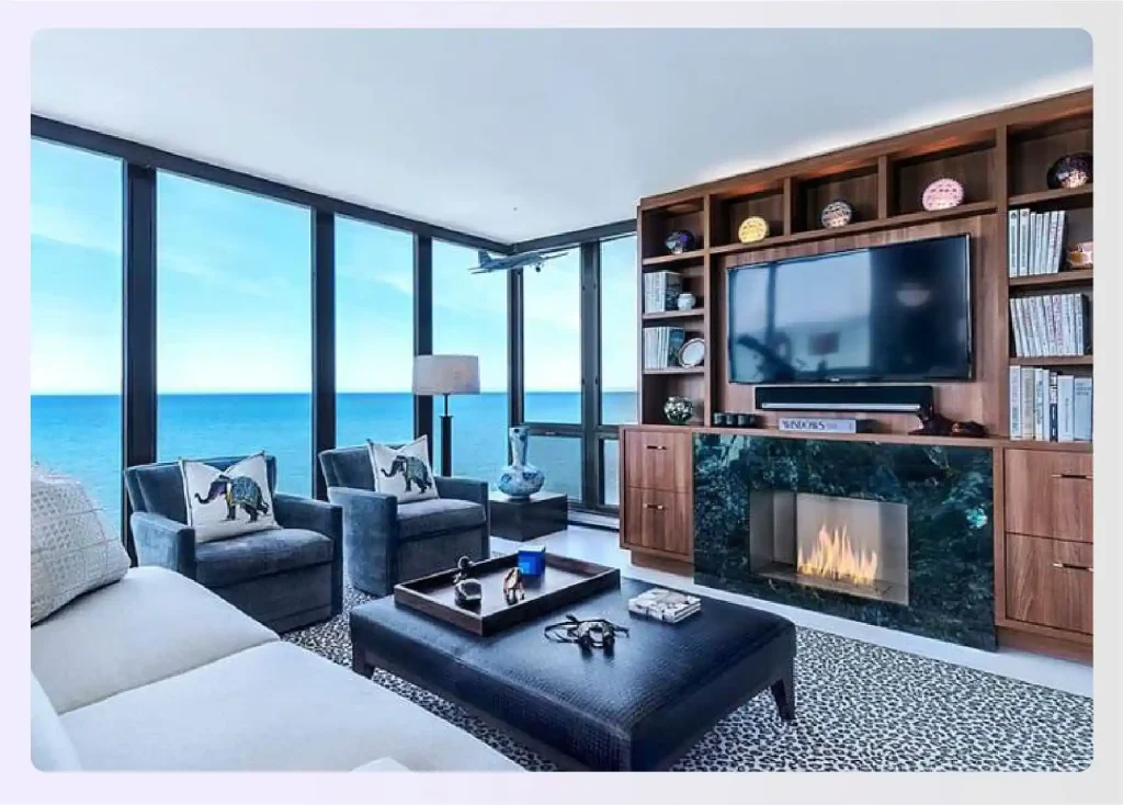 Sunroom with TV and ocean view