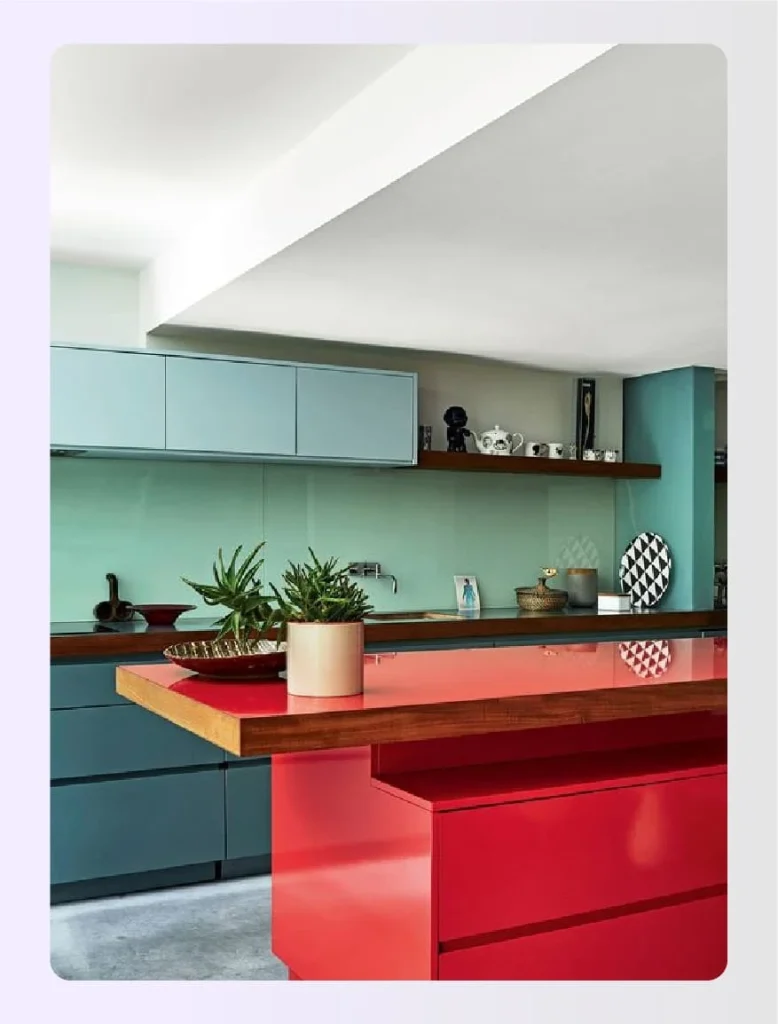 Color blocked kitchen with red island 