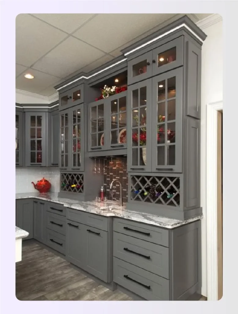 Floor-to-ceiling dark grey kitchen cabinetry 