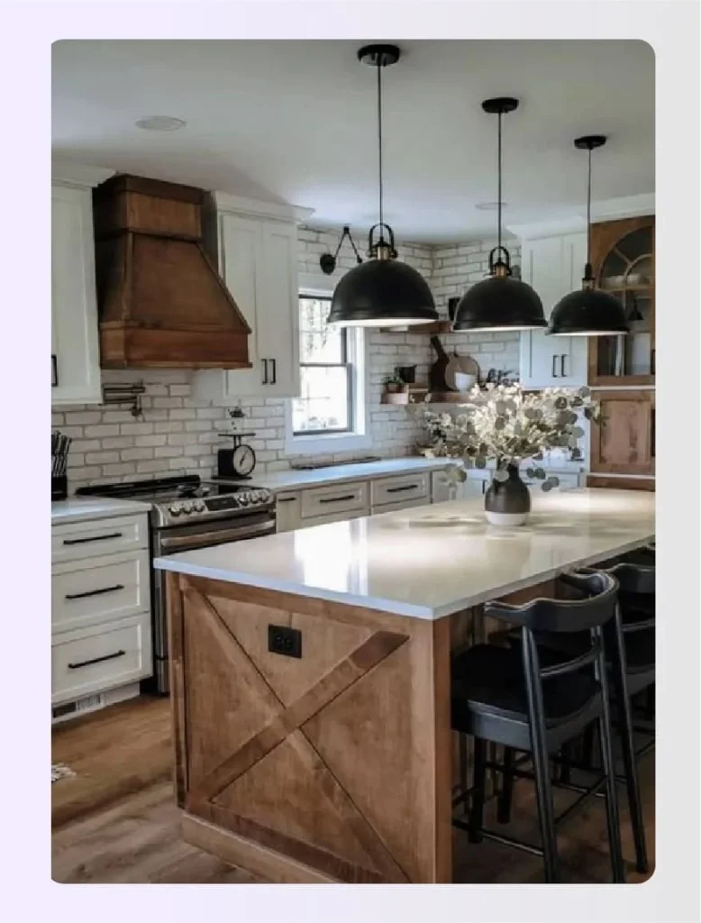 Wooden island with white perimeter cabinets 