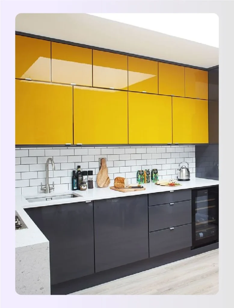 Yellow upper cabinets with grey base units 