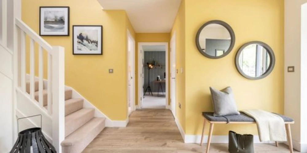 hallway color schemes - pale yellow with black and white