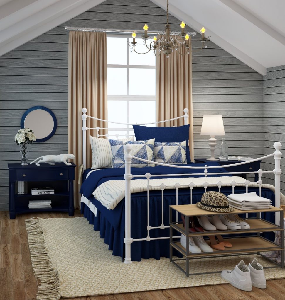 French Country bedroom with a white metal bed frame, blue bedding, and wooden nightstands.