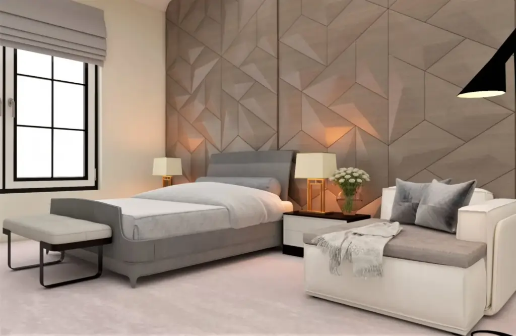 Minimalist bedroom with a gray bed, accent chair, and geometric wall art.