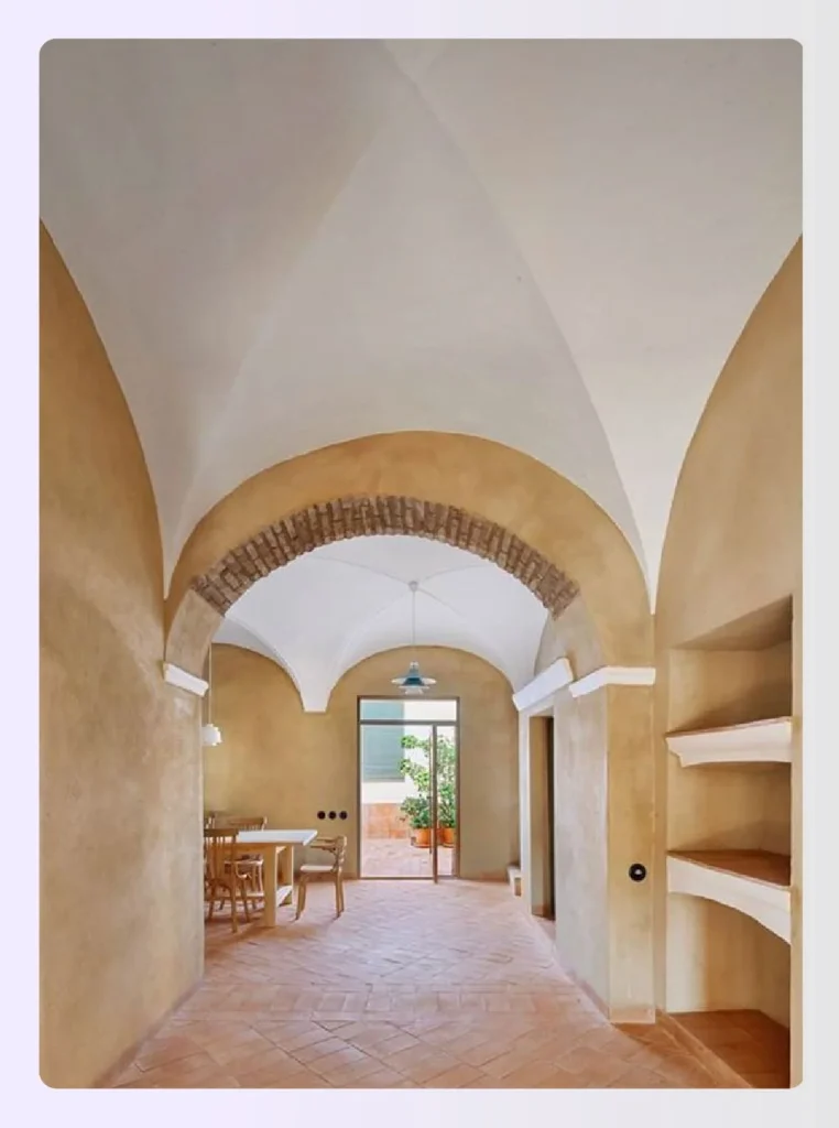 Vaulted arched ceiling in a rustic hallway Vaulted arched ceiling in a rustic hallway