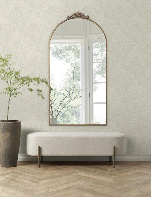 interior arche designs - hang an arched mirror on the wall