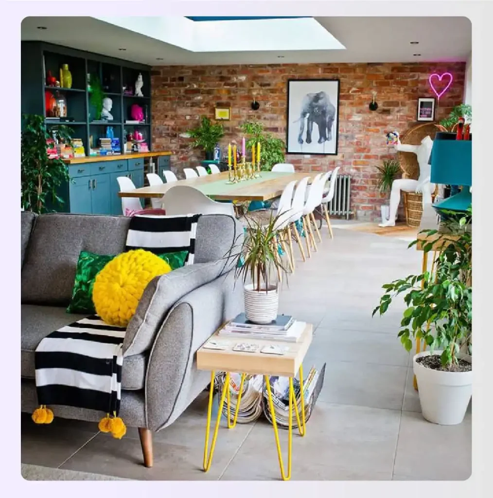 A room featuring concrete, wood, and metal elements